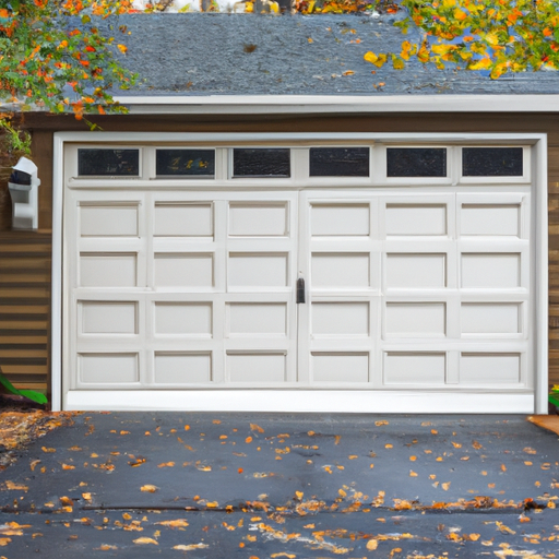 Suburban Ridgewood home exterior with visible garage door, bottom seal, and driveway in late autumn light.
